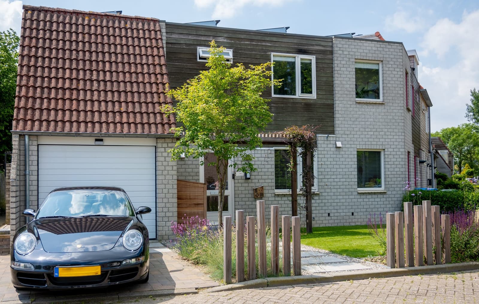 Aangelegde stadstuin in Nijmegen door Van Rijbroek Hoveniers — foto 3 van 11